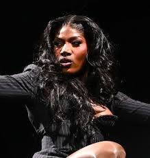 temp_image_1764056018.345992 Ayo Edebiri Gets Electrifying Lap Dance from Doechii at Camp Flog Gnaw Carnival