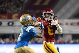 temp_image_1764480625.802966 USC Football Dominates UCLA in Epic Crosstown Showdown, Securing Unbeaten Coliseum Season