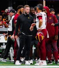 temp_image_1767640601.494346 Kliff Kingsbury and the Commanders: Is the Air Raid Offense Facing a Reckoning?