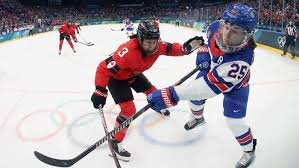 temp_image_1771503904.631616 Hockey Féminin Olympique 2026: Canada vs États-Unis - La Quête de l'Or