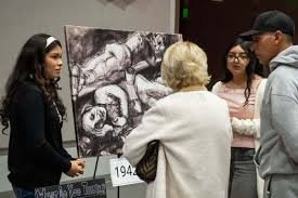 temp_image_1771633344.679801 Showcase of Resilience: Students Exhibit Powerful Holocaust Art