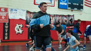 temp_image_1771695178.800024 Championship Standings: Trinity Dominates NCHSAA 3A Wrestling