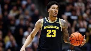 temp_image_1771725715.717611 College Basketball Rankings: Michigan and Florida Lead the Charge