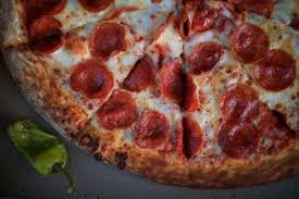 temp_image_1772180397.861252 Pizza Industry Shakeup: Papa Johns and Pizza Hut Close Hundreds of Locations