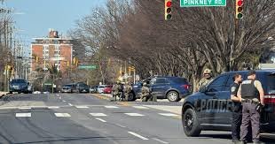 temp_image_1773169510.151613 Baltimore Shooting: Police Officer and Suspect Injured in Northwest Baltimore Standoff
