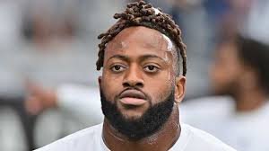 temp_image_1773183859.841329 Osa Odighizuwa: Trade Rumors and the Cowboys' Salary Cap Dilemma