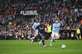 temp_image_1773355701.963817 Lyon's European Journey: A Draw in Vigo Amidst Injury Concerns