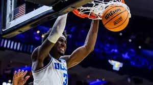 temp_image_1774237229.957323 Donovan Dent Leads UCLA to NCAA Tournament Victory Over UCF