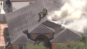 temp_image_1774562648.187958 Miami Lakes House Fire: Family Displaced, Investigation Underway