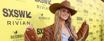 temp_image_1774574686.639148 Lainey Wilson: From Hannah Montana Tribute Artist to iHeartRadio Superstar