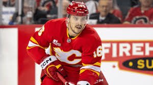 temp_image_1774764051.369497 Dustin Wolf Leads Flames to Home Ice Advantage: Frost Chases Milestone, Lomberg Returns