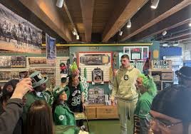 temp_image_1776038270.450143 Ron Harper Jr. Mania: Celtics Bench Players Draw Massive Fan Crowd