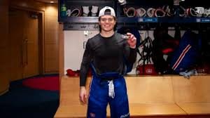 temp_image_1776041603.641478 Nick Suzuki and Cole Caufield: A Dynamic Duo Leading the Canadiens