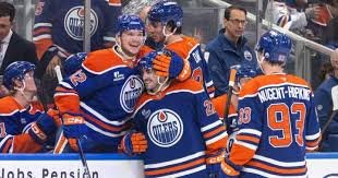 temp_image_1776548917.66297 NHL Score: Edmonton Oilers Dominate Canucks 6-1 as McDavid Smashes Records