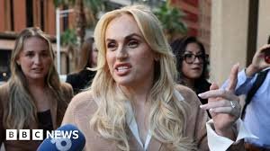 temp_image_1776698305.755043 Rebel Wilson, Rebel Wilson lawsuit, Charlotte MacInnes, Hollywood defamation case, The Deb movie controversy