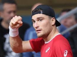 temp_image_1778757300.031236 Raphaël Collignon: The Belgian Tennis Star's Road to Roland-Garros