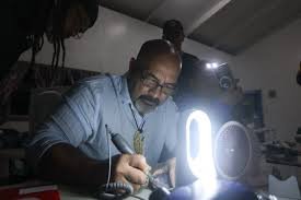 temp_image_1780961576.46418 Preserving Tradition: Master Carver Tokerau Jim Leads Shell Carving Workshop in Cook Islands