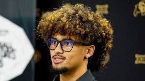temp_image_1787455880.812723 From Gridiron to Diamond: Julian Lewis Steals the Spotlight at Rockies Game